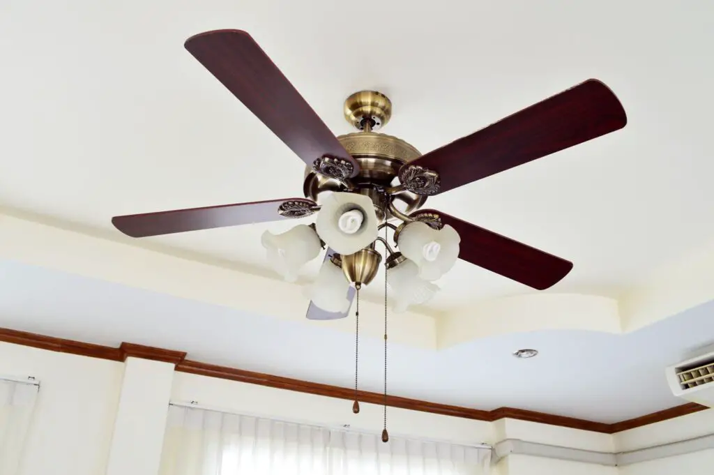 Can I use screws that are longer than the recommended length for my ceiling fan box?